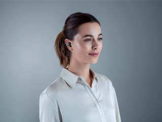 Woman wearing earbuds