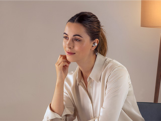 Woman wearing earbuds