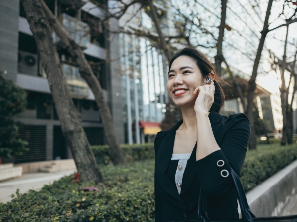 Female talking on earphones