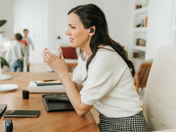 Female working with earphones