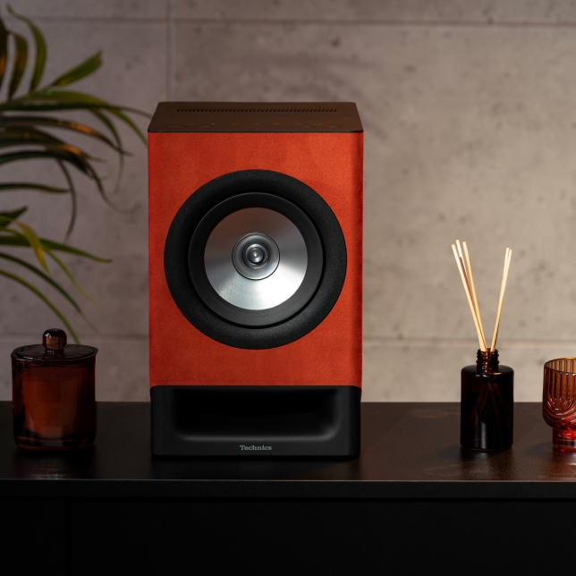 Details of the Technics SC -CX700 wireless Hi-Fi speaker in a stylish living room, in Terracotta Brown colour.