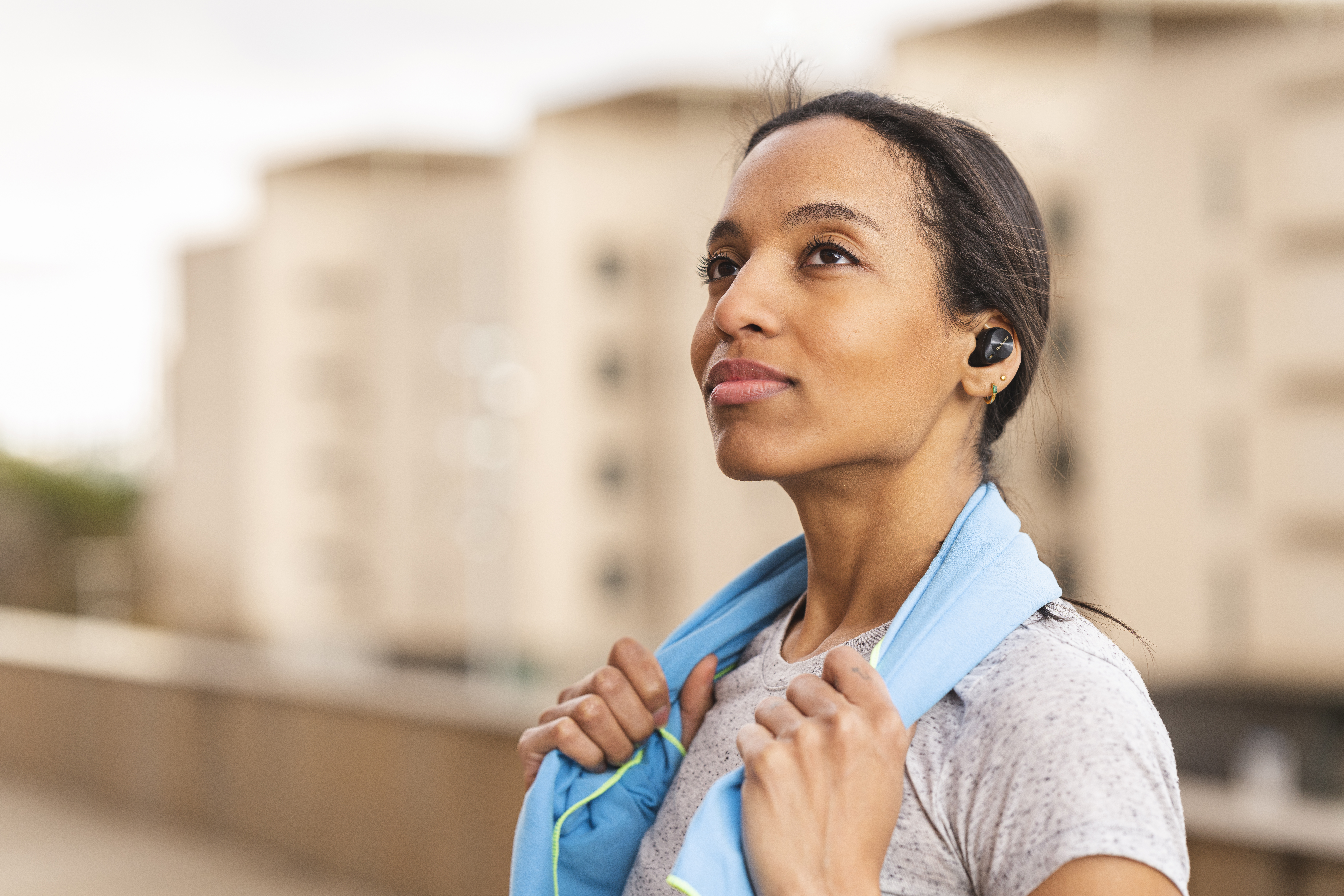 Female working out with earphones
