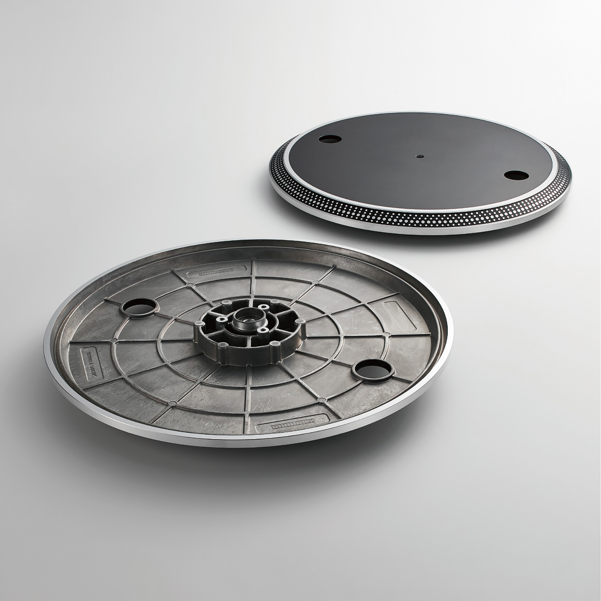 Two-layer aluminium die-cast platter with vibration-damping rubber