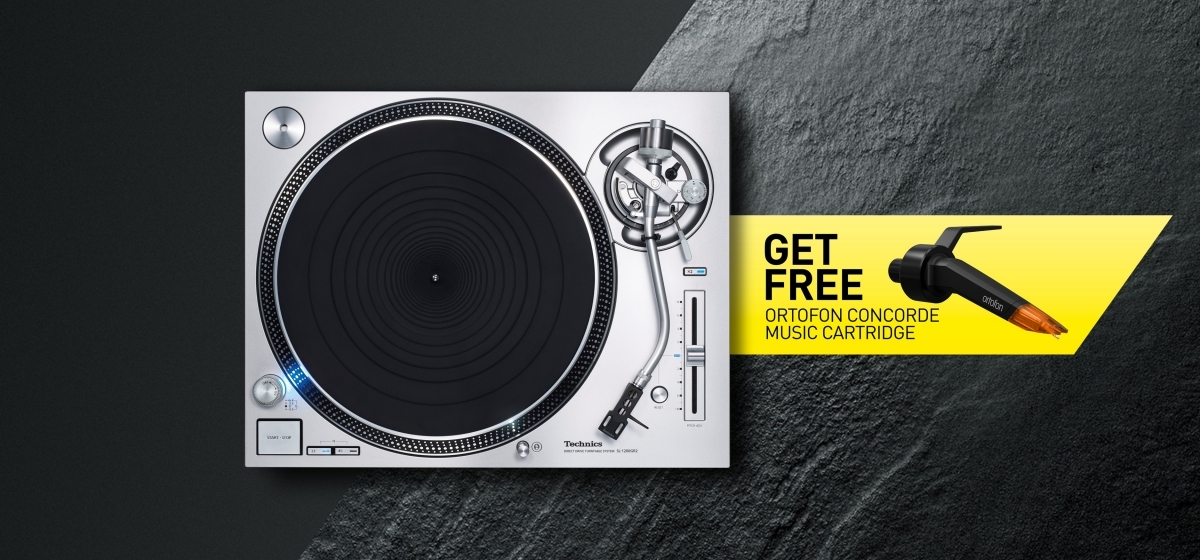 Technics SL-1200GR2 direct drive turntable on dark textured background with a yellow banner showing 'Get free Ortofon Concorde music cartridge' offer.