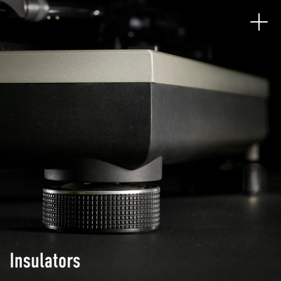 Close-up photograph of the adjustable insulator foot beneath a Technics turntable chassis, with the label "Insulators" in white text at the bottom left.