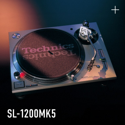 Photograph of the Technics SL-1200MK5 turntable in silver finish with a Technics-branded slipmat, shot against a dark background with an orange gradient, with the model name "SL-1200MK5" displayed in the lower left.