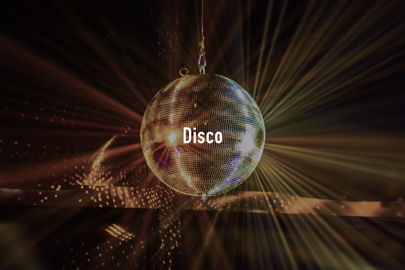 A glittering mirror disco ball hangs against a warm, dramatic light background with the word "Disco" overlaid in white text at the centre.