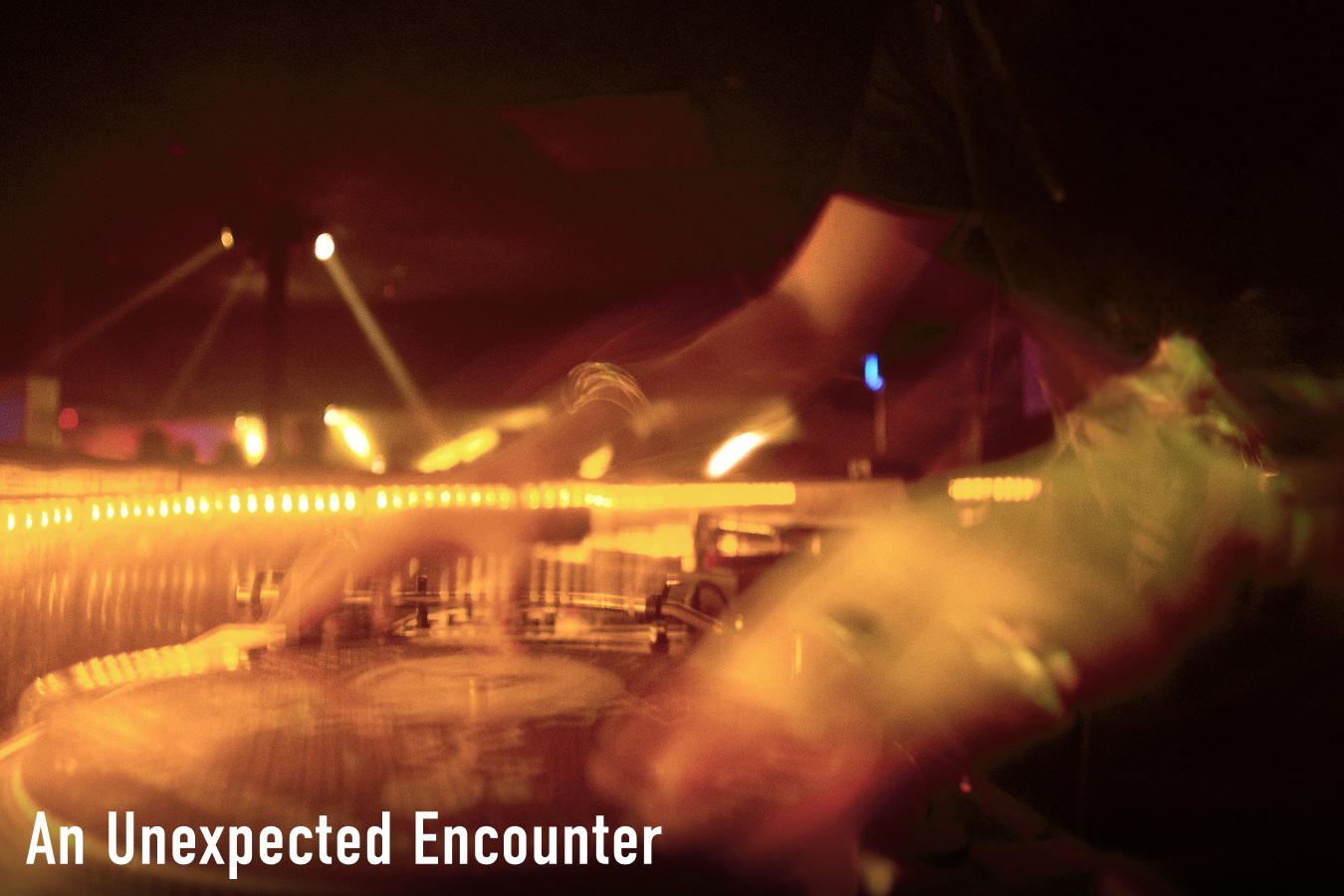 A close-up, motion-blurred photograph of a DJ performing on turntables under warm stage lighting, with the caption "An Unexpected Encounter" in white text at the bottom.